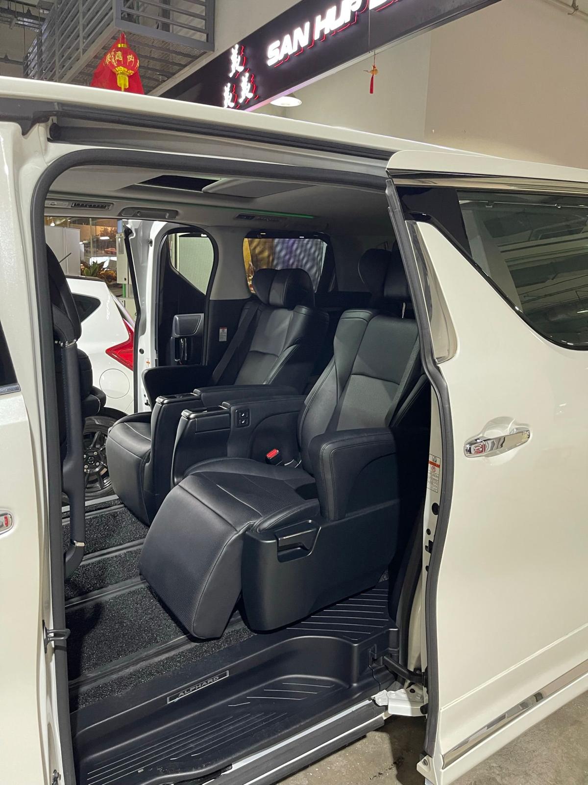 Toyota Alphard limo with sliding door open