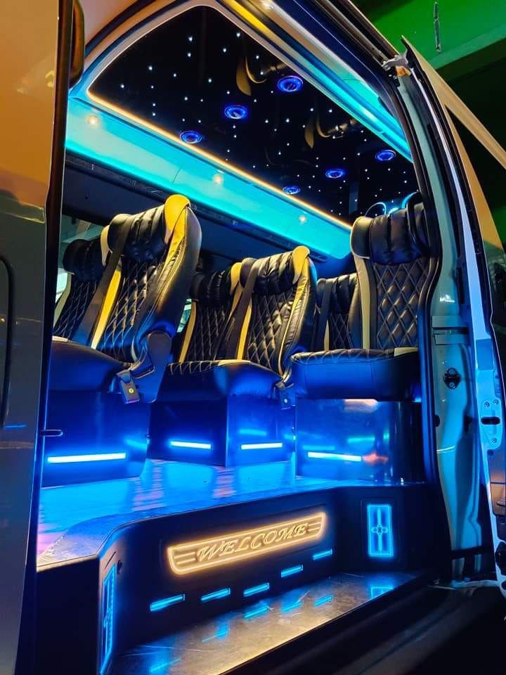 MaxiCab with blue welcome lights